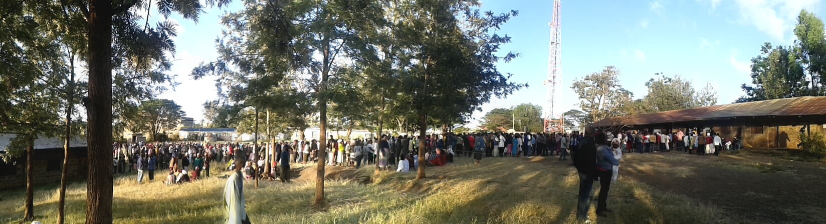 Voters queue at a polling centre in Kenya used as the issue cover for Executive Express Issue 013